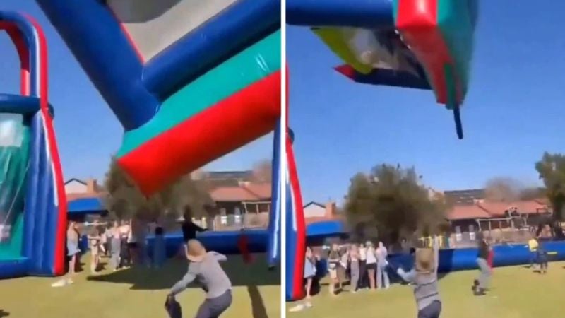 Castillo inflable sale volando con niños dentro durante festival escolar en Sudáfrica
