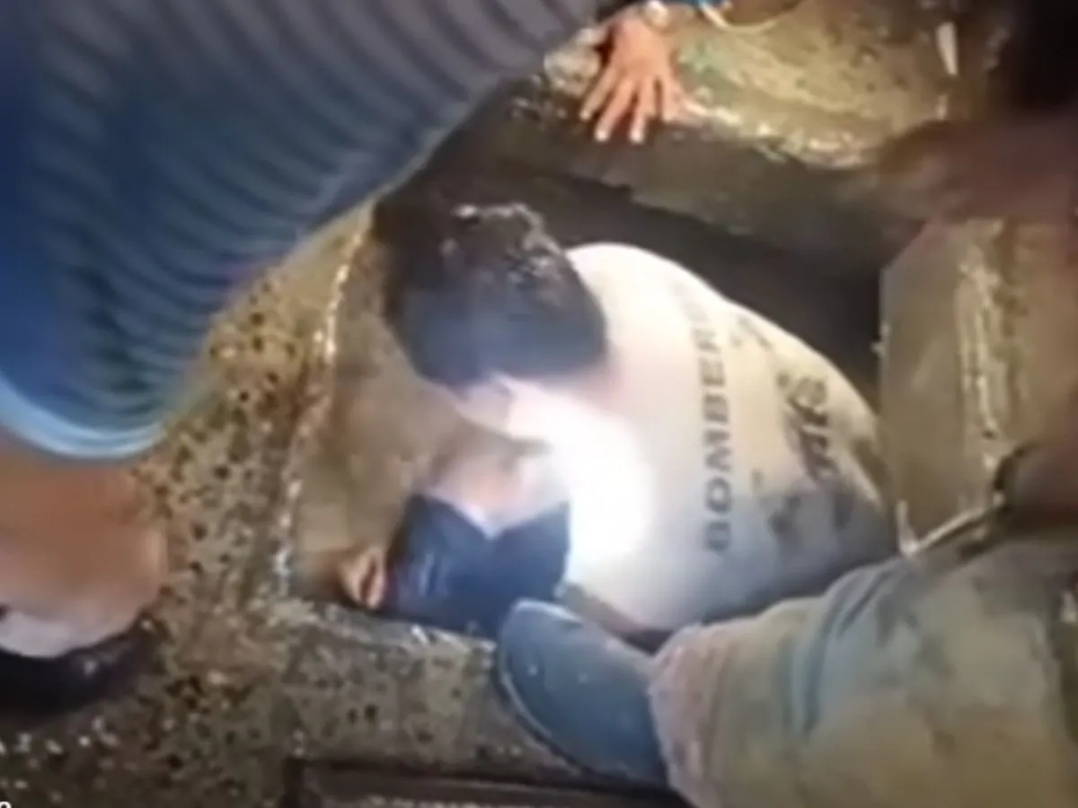 Rescate alcantarilla